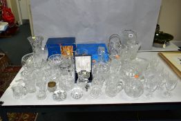 A COLLECTION OF CUT GLASS, CRYSTAL VASES AND BOWLS, etc by makers including Waterford, Stuart and