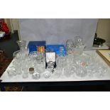 A COLLECTION OF CUT GLASS, CRYSTAL VASES AND BOWLS, etc by makers including Waterford, Stuart and
