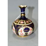 A ROYAL CROWN DERBY BUD BASE, pattern 1128, printed, painted and incised marks, height 9.5cm (