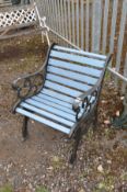 A CAST IRON AND WOODEN SLATTED GARDEN CHAIR width 61cm