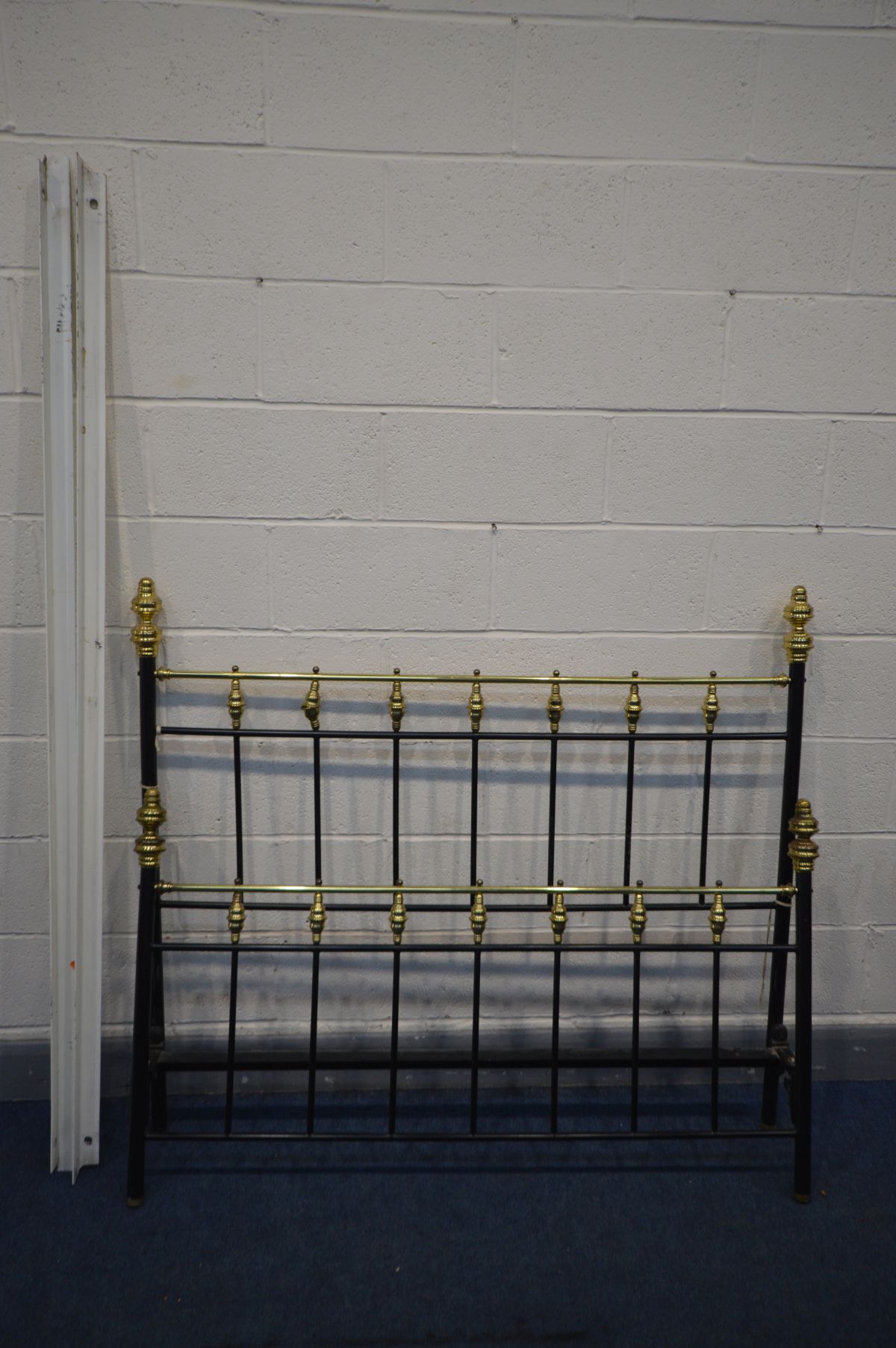 A VICTORIAN STYLE BRASS AND METAL 4FT6 BEDSTEAD