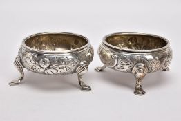 A PAIR OF GEORGE II OPEN SILVER SALTS, cauldron shape, embossed floral design, vacant cartouche,