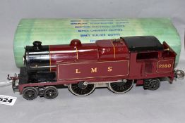 A HORNBY 0 GAUGE NO 2 SPECIAL TANK LOCOMOTIVE, No 2180, L.M.S lined maroon livery (E220), appears