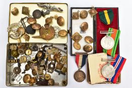 A PLAYERS NAVY CUT TIN, full of Military related buttons, pin badges cap badges, together with a