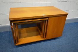 A MCINTOSH AND CO TRISTOR MULTI FUCTIONAL COFFEE TABLE, with a swivel fold out top, lower cabinet