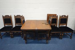 AN EDWARDIAN WALNUT WIND OUT DINING TABLE, with one additional leaf, extended length 149cm x