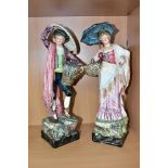 A PAIR OF ROYAL DUX FIGURINES OF CONTINENTAL STREET VENDORS, the gentleman with a basket of fish,