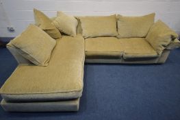 A BEIGE UPHOLSTERED CORNER SOFA, with scatter cushions back, overall length 284cm x depth at