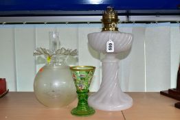 A WHITE OPAQUE OIL LAMP, with clear chimney and etched glass shade, height 36cm to top of fitting,