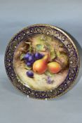 A ROYAL WORCESTER FRUIT STUDY CABINET PLATE, SIGNED R.SEBRIGHT, blue, gilt and enamelled border