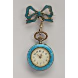 A WHITE METAL GUILLOCHE ENAMEL FOB WATCH, designed with a blue guilloche enamel bow shaped brooch