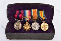 A WW1 ERA METAL FLIP TOP BOX containing a WW1 group of miniature medals to including Distinguished