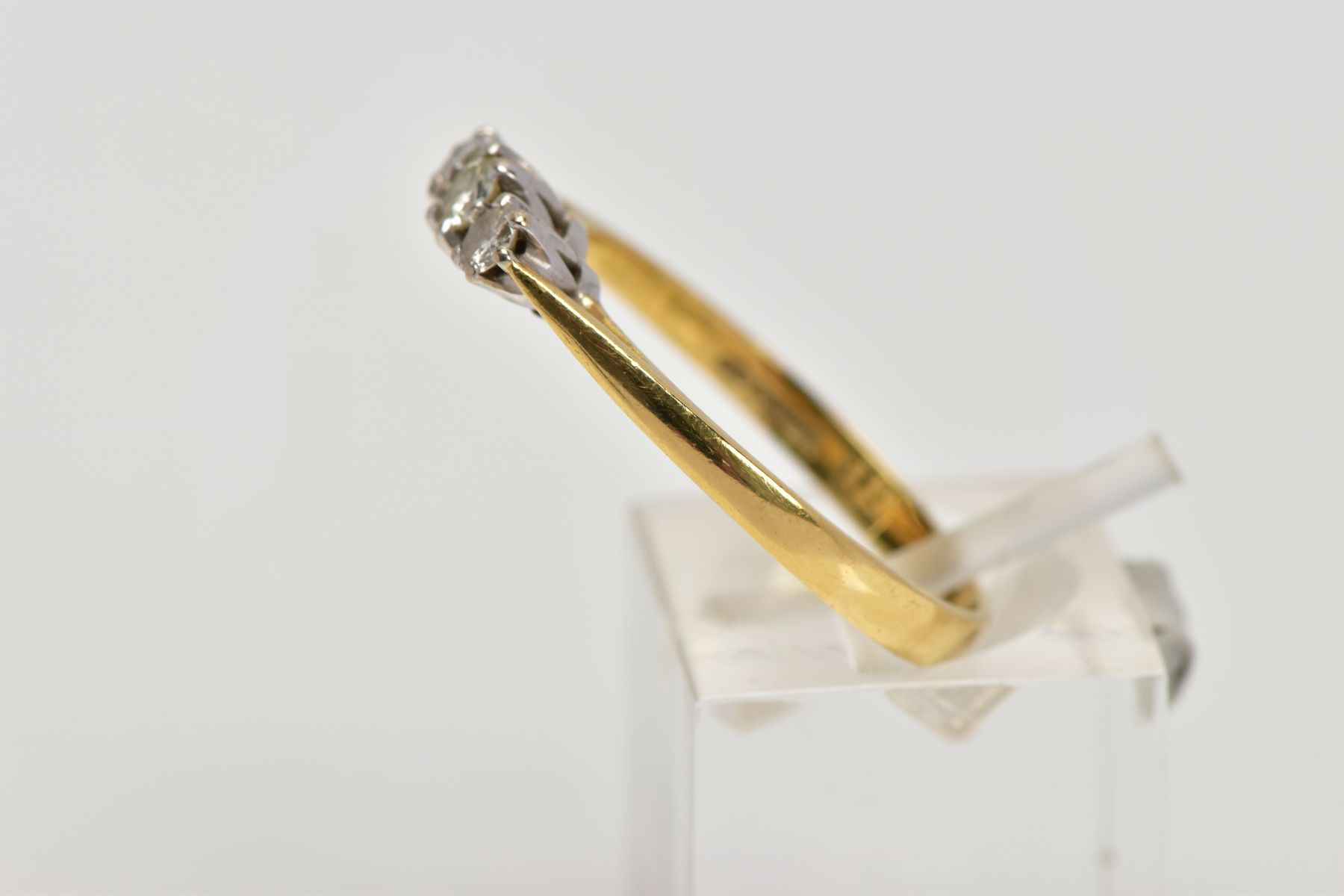 AN 18CT GOLD THREE STONE DIAMOND RING, designed with a row of three graduated round brilliant cut - Image 2 of 4