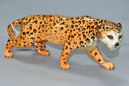 A BESWICK LEOPARD, model 1082, approximate length 30cm, height 12cm (Condition Report:- good)