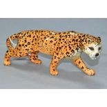 A BESWICK LEOPARD, model 1082, approximate length 30cm, height 12cm (Condition Report:- good)