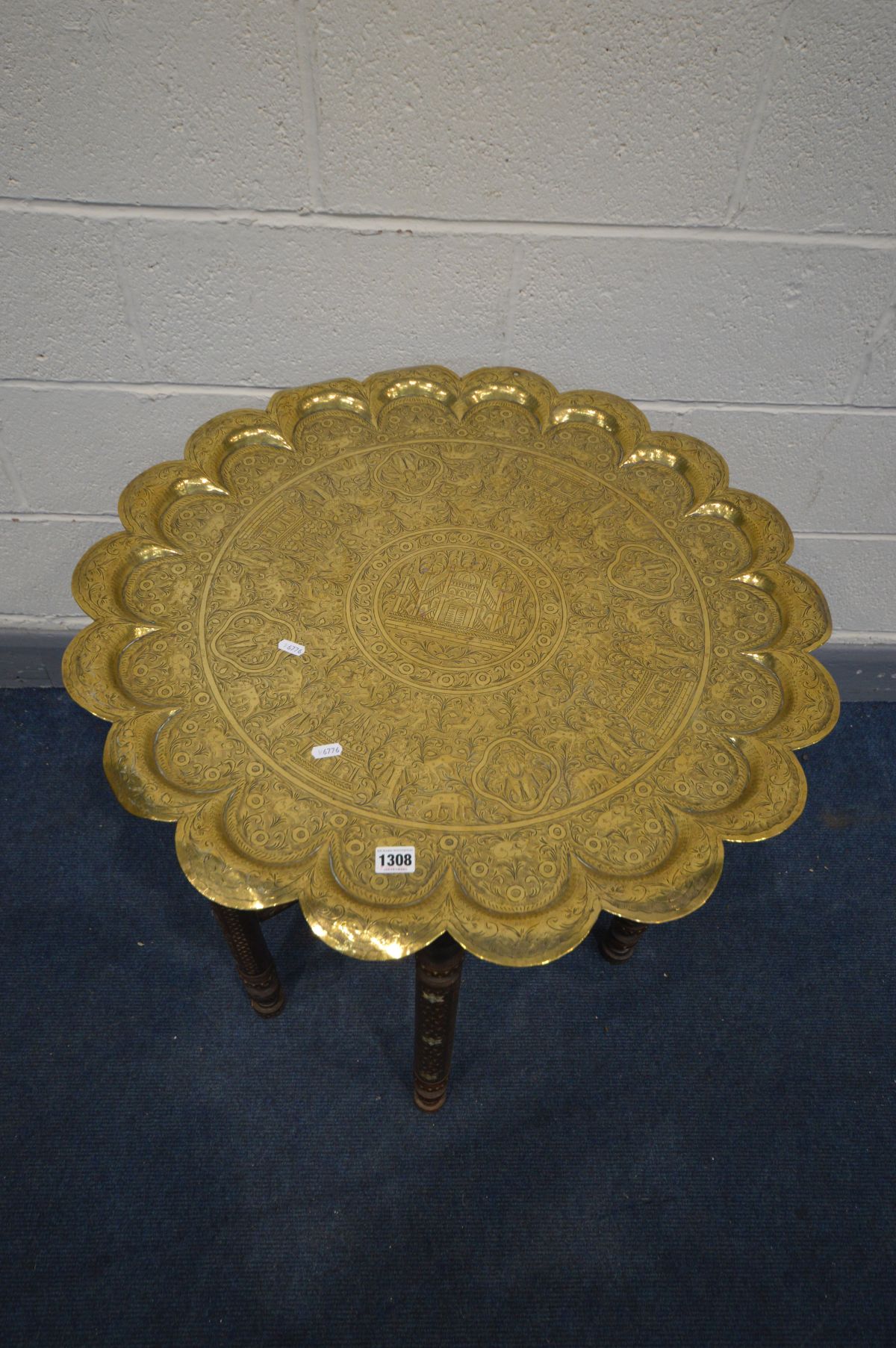 AN ANGLO-INDIAN BRASS TOP TABLE, depicting the Taj Mahal, on a folding Moorish style base, - Image 2 of 4