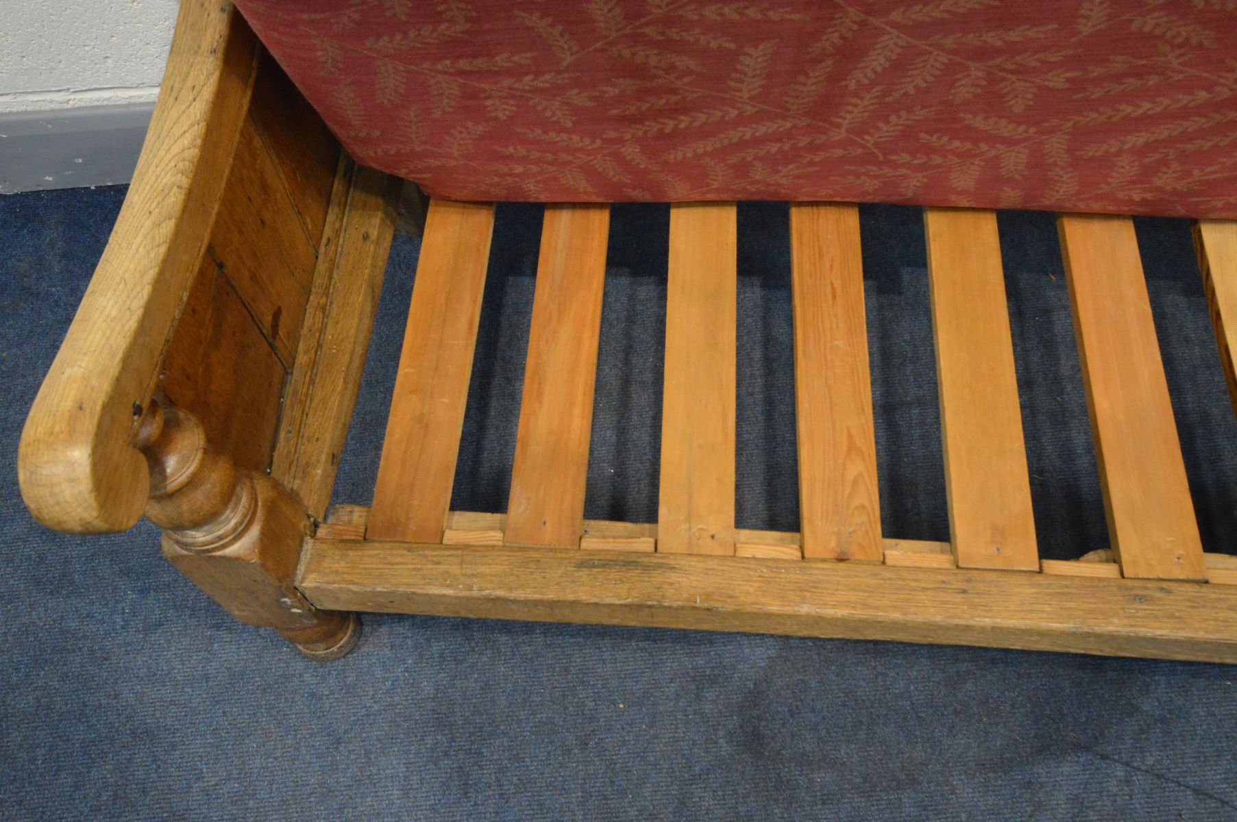 A 19TH CENTURY OAK HALL SETTLE, with panelled sides and back, and scrolled armrests, on turned front - Image 6 of 7