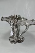 A SILVER PLATED WMF ART NOUVEAU COMPORT, in the form of a fairy holding a bird with two lily pads at