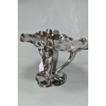 A SILVER PLATED WMF ART NOUVEAU COMPORT, in the form of a fairy holding a bird with two lily pads at