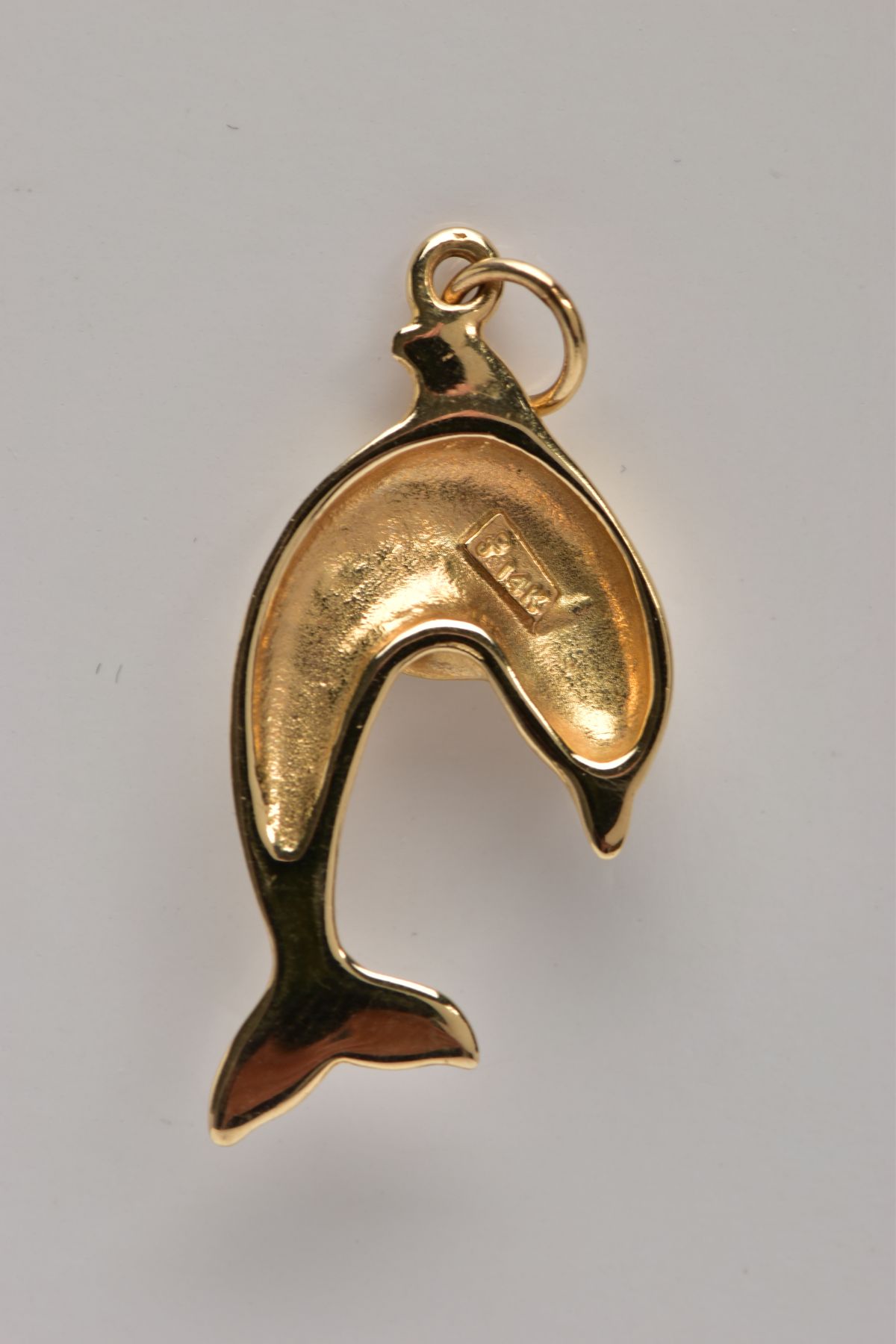 A YELLOW METAL DOLPHIN PENDANT, fitted with a suspension ring, stamped to the reverse '14k', - Image 2 of 2