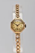 A LADIES 9CT GOLD WRISTWATCH, round silver dial (discoloured), Arabic numerals, seconds subsidiary