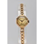 A LADIES 9CT GOLD WRISTWATCH, round silver dial (discoloured), Arabic numerals, seconds subsidiary