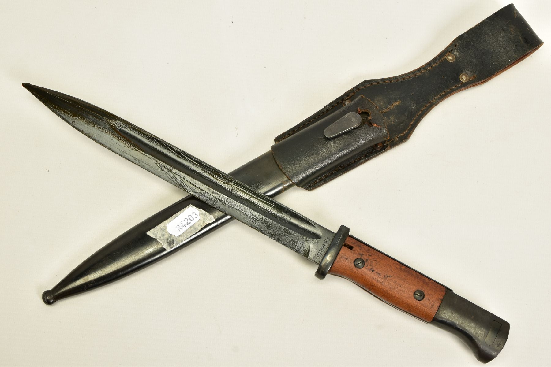 A WWII NON MATCHING NUMBERS GERMAN MAUSER RIFLE BAYONET AND SCABBARD frog etc. MKIII, by F.W.Holler,