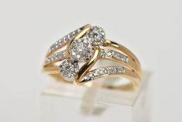 A 9CT GOLD DIAMOND SET RING, designed as a tapered trifurcated band partly set with single cut