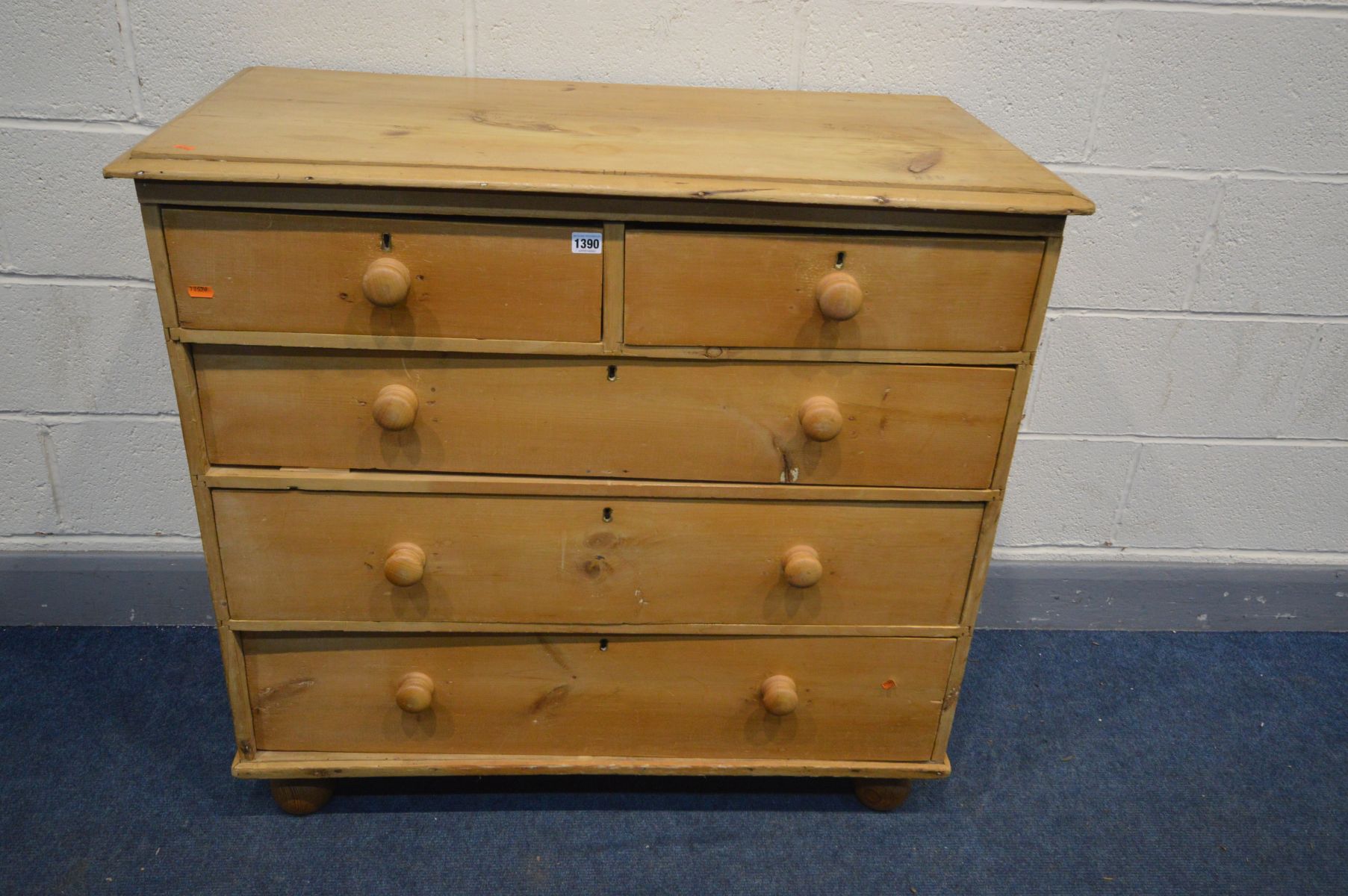 A VICTORIAN PINE CHEST OF TWO OVER THREE LONG DRAWERS, turned handles and bun feet, width 101cm x