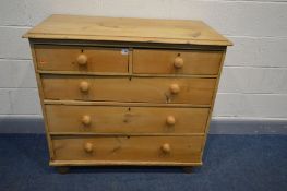 A VICTORIAN PINE CHEST OF TWO OVER THREE LONG DRAWERS, turned handles and bun feet, width 101cm x