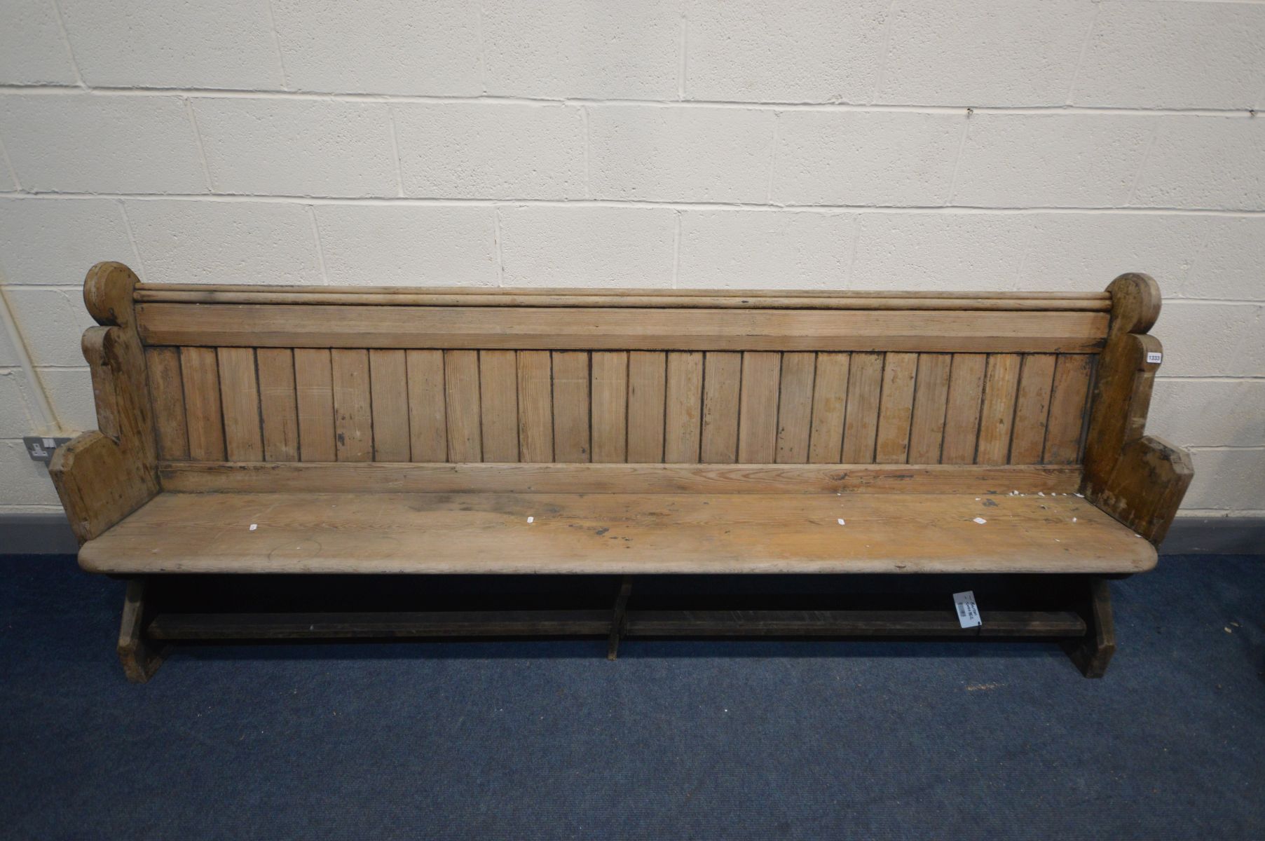 A VICTORIAN PINE PEW, length 245cm