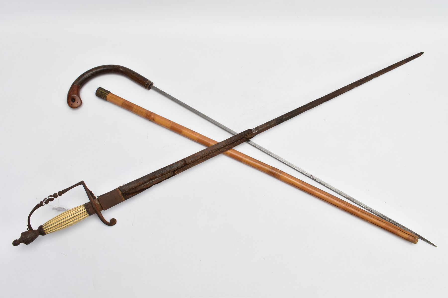 AN EARLY 20TH CENTURY SWORD STICK, blade length approximately width 70cm, long umbrella style