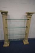 A CONTINENTAL STYLE FOUR TIER SHELVING UNIT, made up of two cream resin Corinthian columns joined by