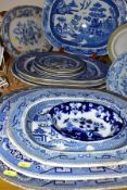 FIFTEEN PIECES OF BLUE AND WHITE CERAMICS, mostly late Victorian, comprising eight meat plates,