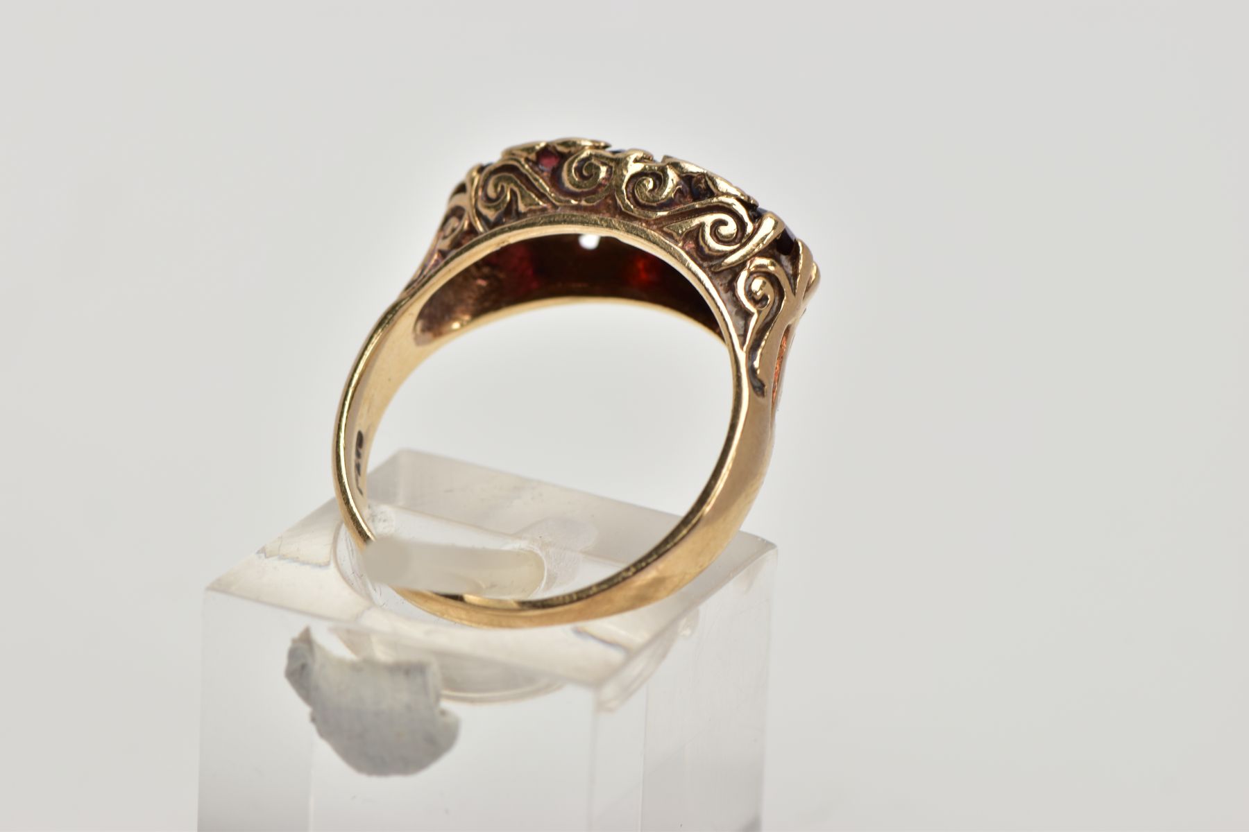 A 9CT GOLD THREE STONE GARNET RING, designed with a row of three graduated oval cut garnets, - Image 3 of 4