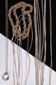 A PARCEL OF SILVER AND WHITE METAL CHAINS, to include a heavy bi-colour rope twist chain, fitted