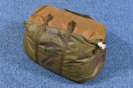 A MILITARY ROLL-OUT SLEEPING BAG contained in its own cover