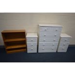A TALL WHITE CHEST OF FIVE DRAWERS, and a pair of matching three drawer bedside cabinets, beech open