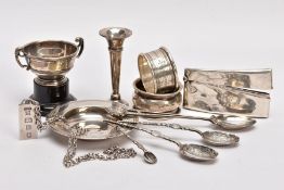 A TRAY OF SILVER ITEMS, to include a small circular dish with a wide flat rim, hallmarked 'William