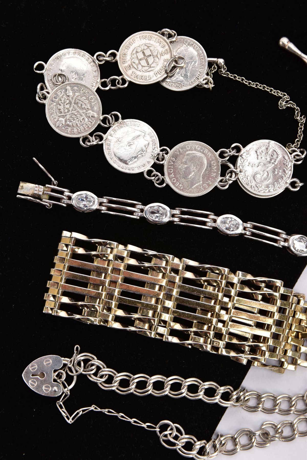 A PARCEL OF SILVER BRACELETS, to include a wide gate bracelet, fitted with a heart clasp and an - Image 2 of 3