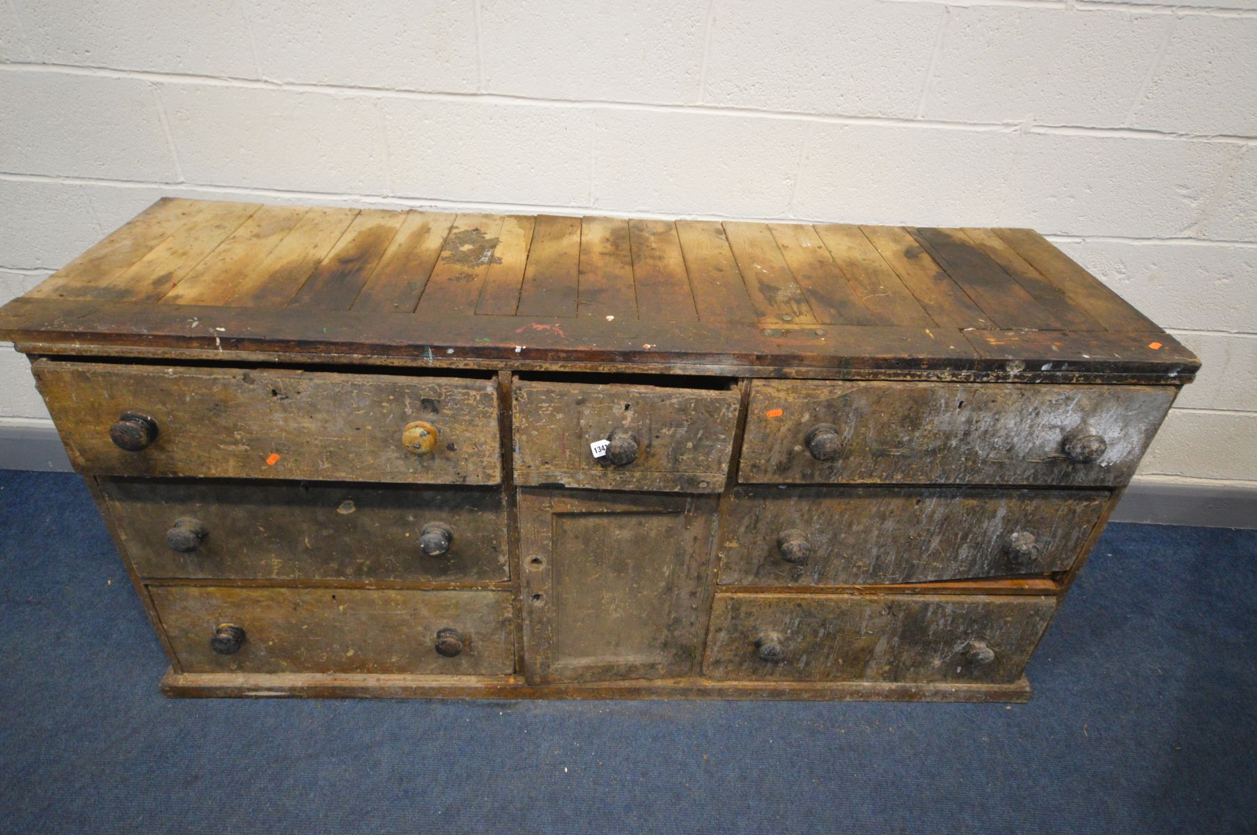 A 19TH CENTURY PINE SHOP COUNTER, made up of six assorted drawers, central panelled cupboard door, - Image 2 of 5