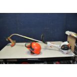 A STIHL FS40 PETROL STRIMMER and a Stihl Helmet with ear defenders and screen attached (starts and