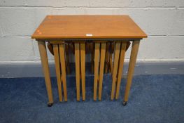 A MID 20TH CENTURY TEAK NESTING TABLES, possibly Poul Hundevad, Denmark, comprising four circular