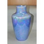 A RUSKIN POTTERY SHOULDERED VASE OF TAPERING FORM, with mottled lavender lustre glaze, impressed