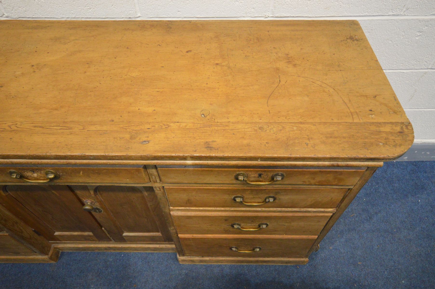 A VICTORIAN PINE SIDEBOARD, nine assorted drawers, flanking double cupboard doors, length 184cm x - Image 3 of 4