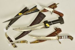 FIVE x EXAMPLES OF MIDDLE EASTERN/ARABIC HAND DAGGERS. some are more ornate than others, some well