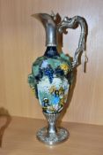 A MID 20TH CENTURY ITALIAN PORCELAIN AND SILVER PLATED CLARET JUG OF BALUSTER FORM, the hand painted