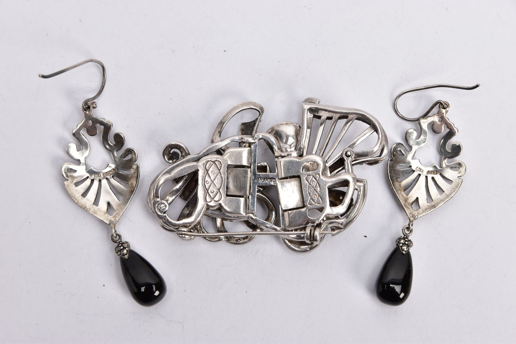 A PAIR OF WHITE METAL MARCASITE AND ONYX EARRINGS, AND A WHITE METAL MARCASITE CLIP BROOCH, the pair - Image 2 of 3