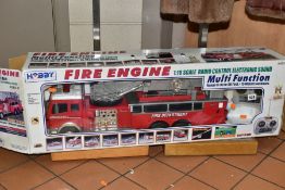 A HOBBY ENGINE FIRE ENGINE, 1:18 scale radio control, shoots water and sounds a siren, boxed with