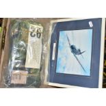 A BOX CONTAINING A SEALED PAIR OF MILITARY VBC MKIV DPM TROUSERS, framed print of a Spitfire MK1